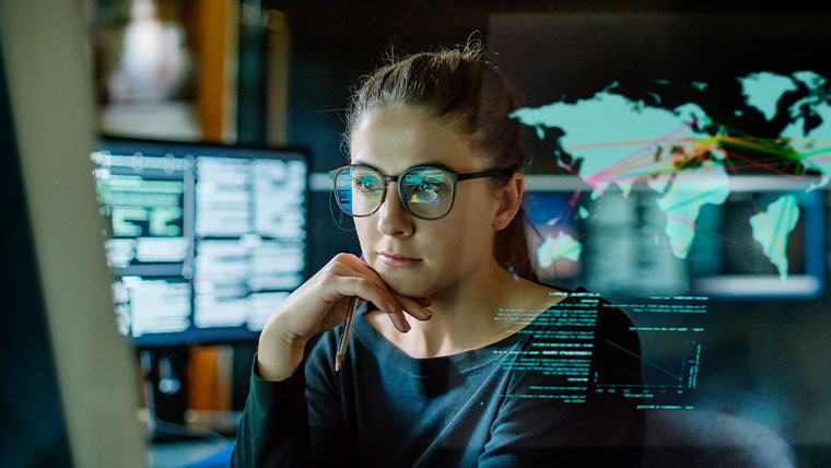 woman looks at data in future office